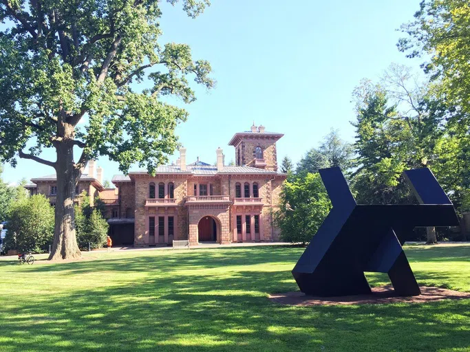 Prospect House with a sculpture on the front