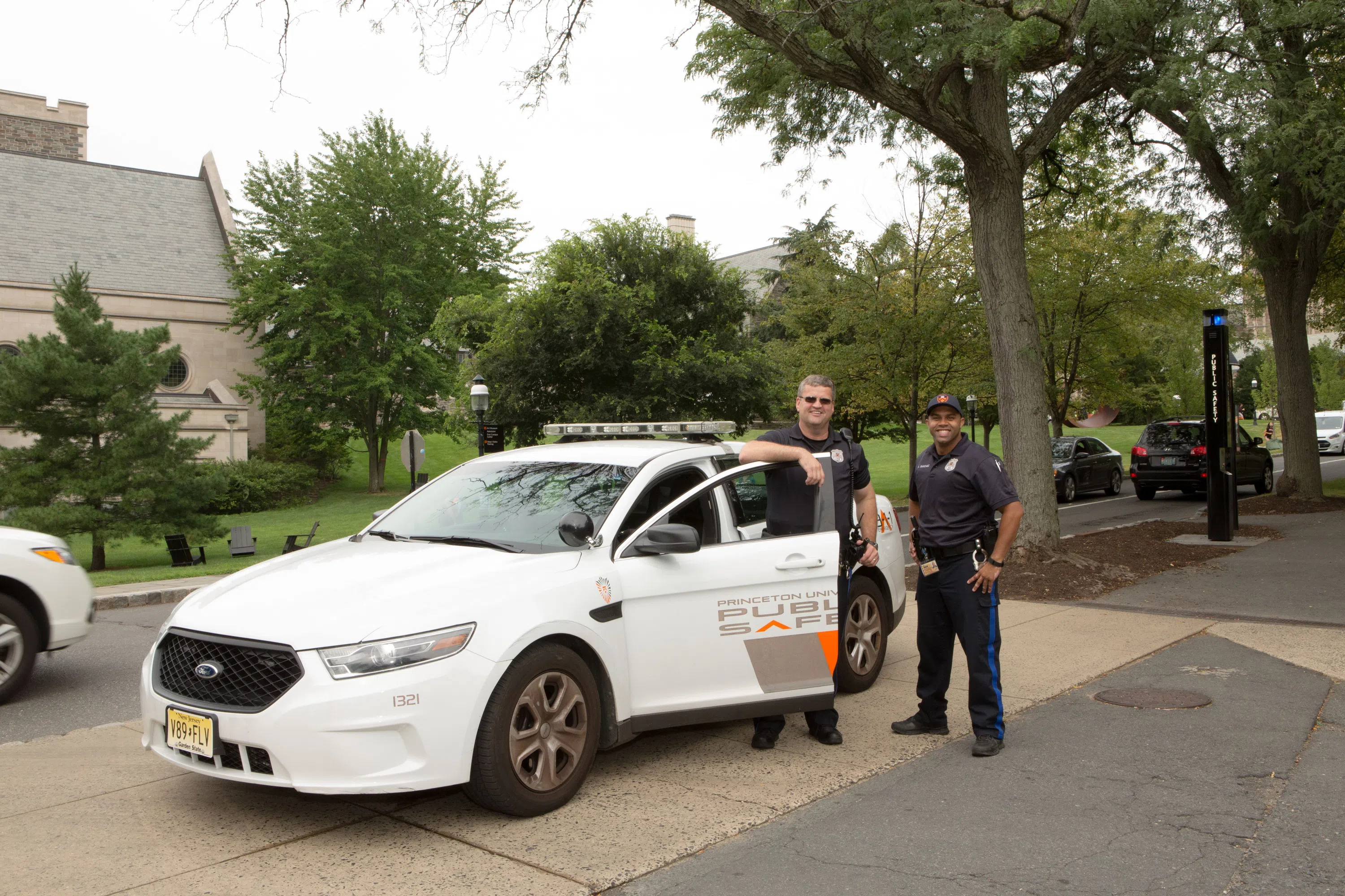 Public Safety standing by their PSAFE car