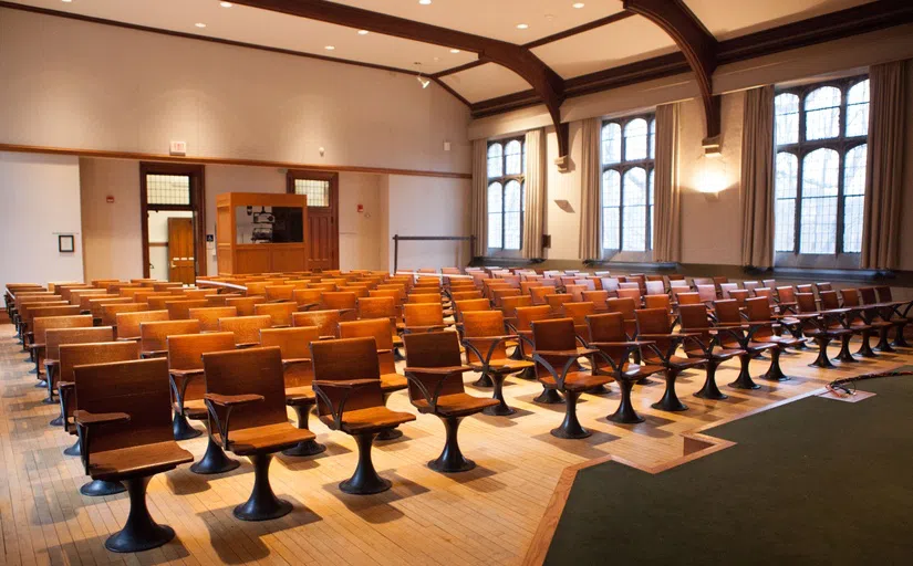 McCosh classroom with rows of wooden chairs and desks