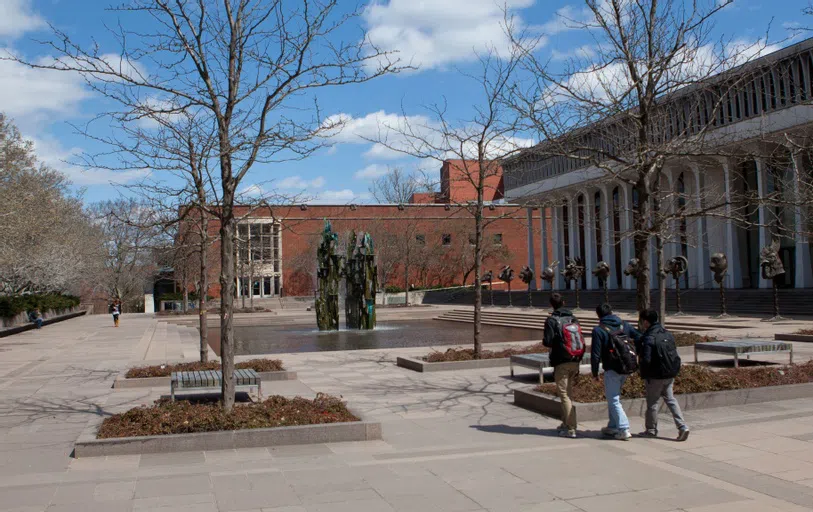 Students Walking in Courtyard