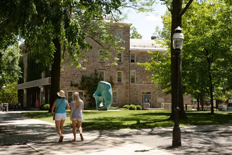 Sunny brick and stone Morisson Hall exterior