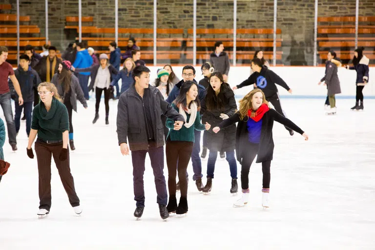 Students figure skating at Baker Rink