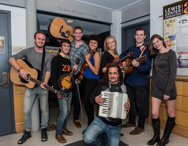 Group of students holding various instruments