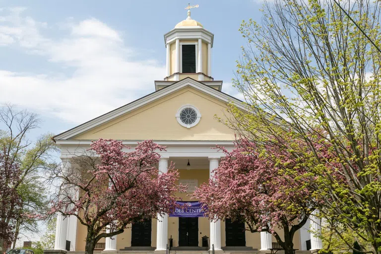 Exterior shot of College Hall in spring