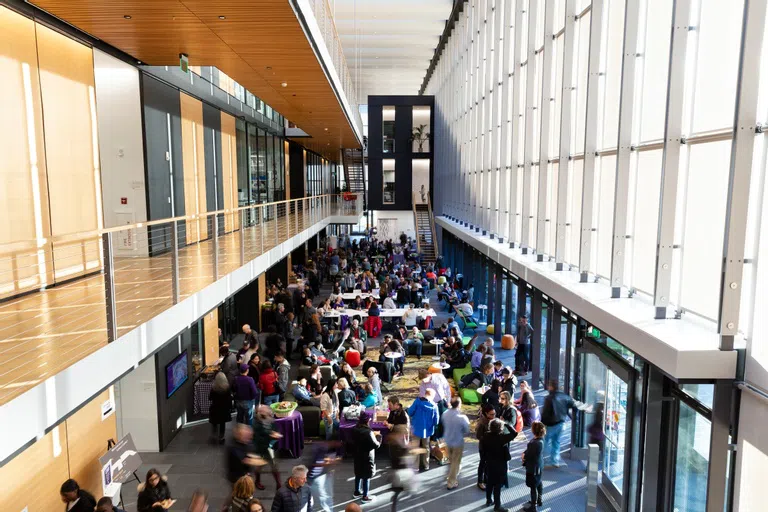 Interior shot of Science Center lobby full of visiting families.