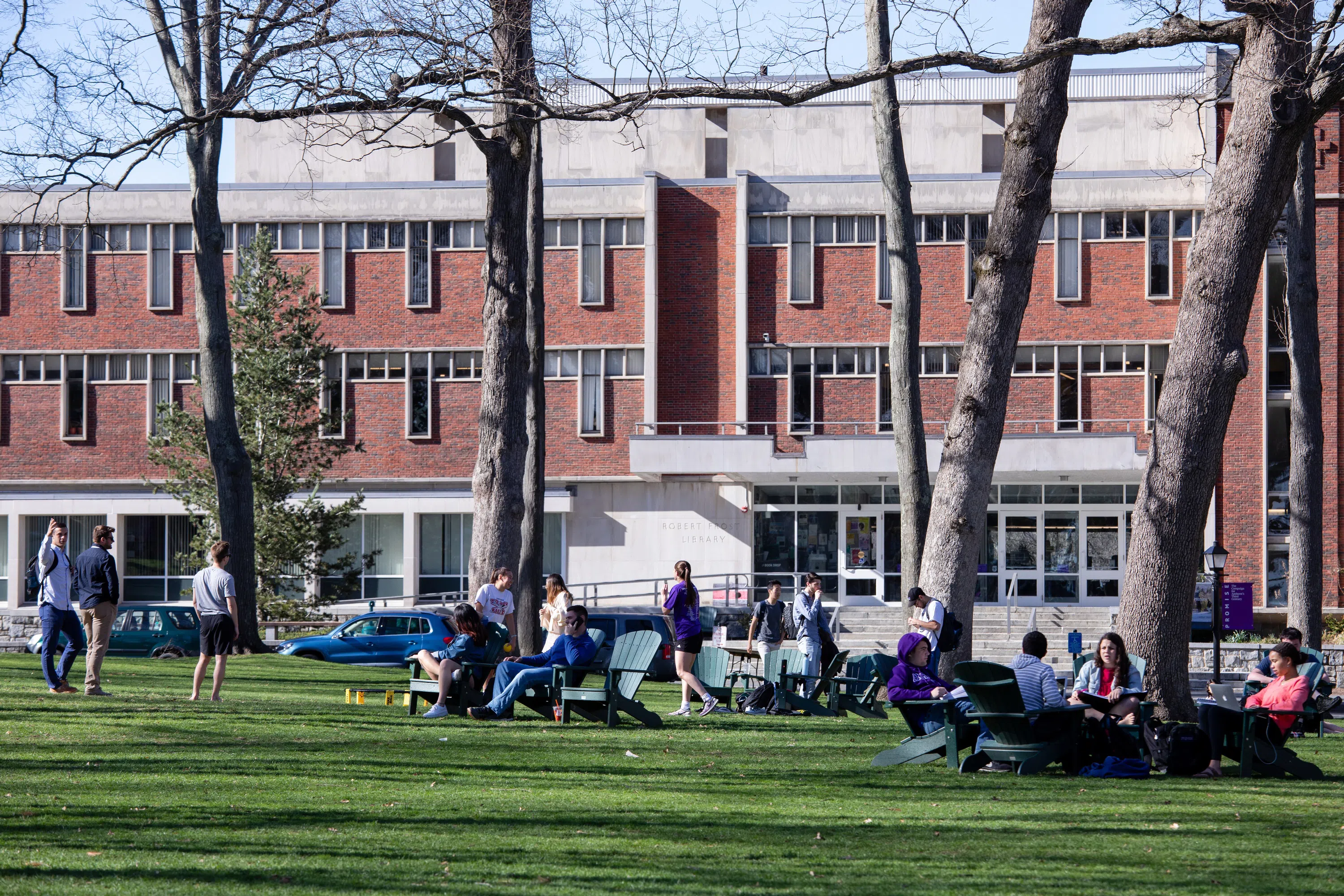 Exterior shot of Frost Library with students hanging on quad in front.