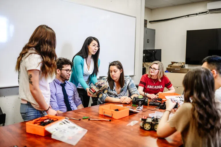 Students view a demonstration from their Computer Science professor