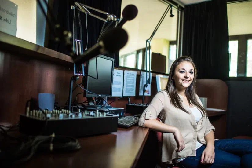 Student in the Arcadia radio station