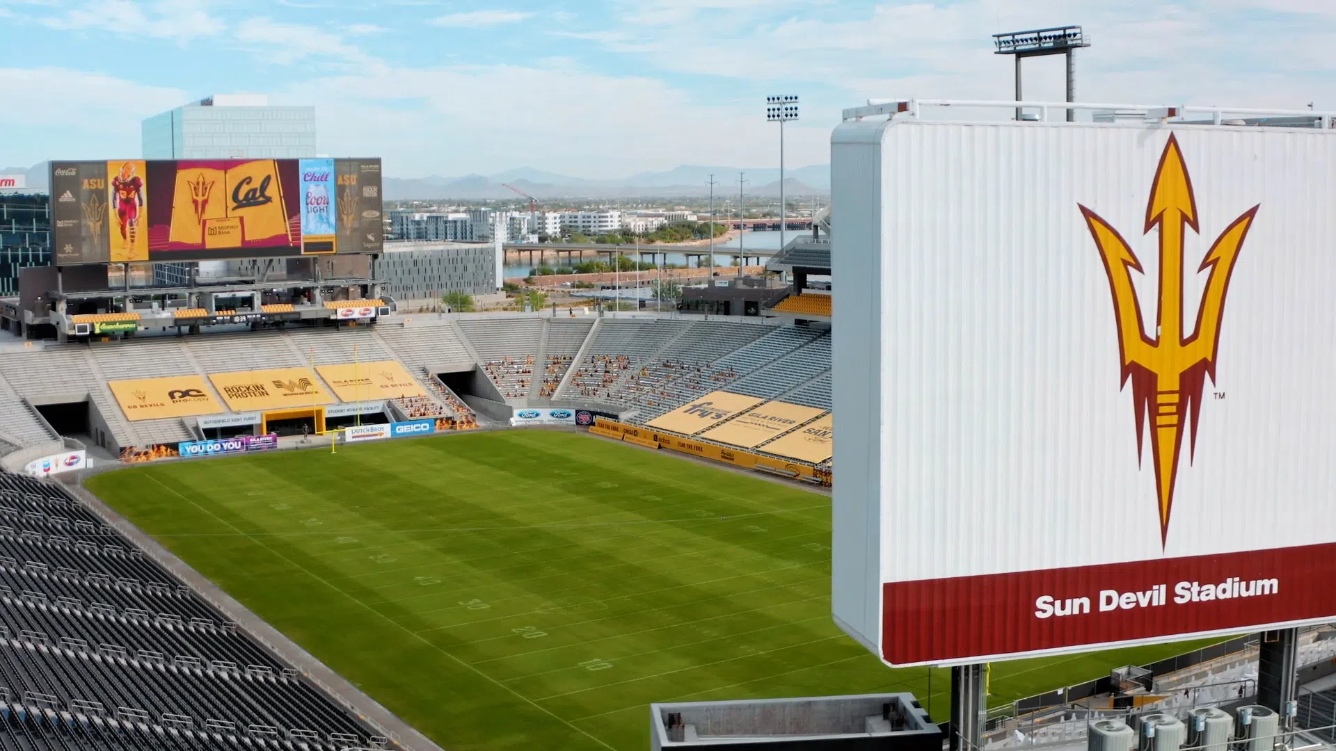 View of football field and jumbotron with images related to an upcoming game against UC Berkeley. 