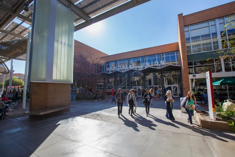 Students walking outside Memorial Union building.