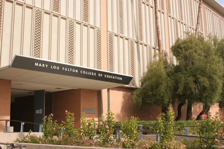 Flower-lined entrance to Farmer Education Building.