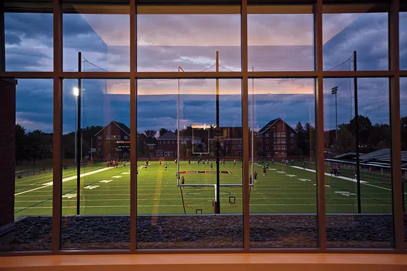 A view of Garcelon Field through the windows of Commons