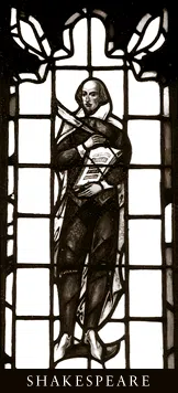 A black and white photo of a stained glass window that features Shakespeare. 