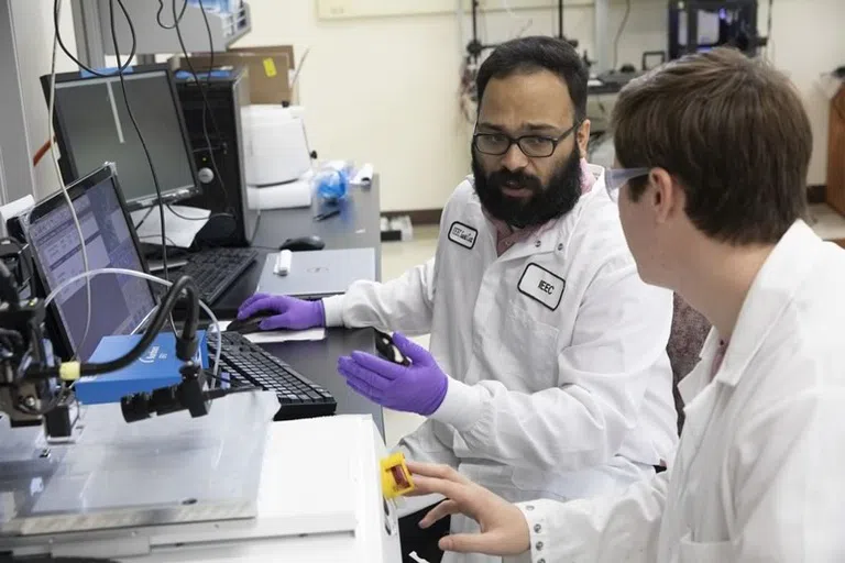 Students conducting research in a lab