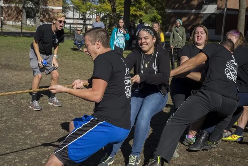 Students participating in tug-of-war as part of a classic event: Hinman Hysteria