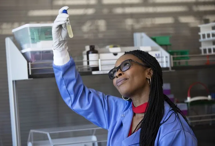 Student conducting scientific lab