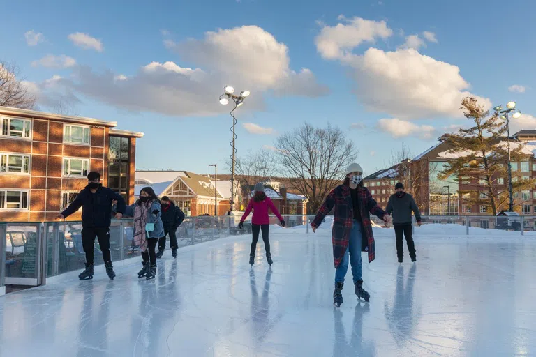 Students using the ice skating rink