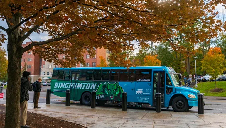 The Blue Binghamton OCCT Buses at the University Union bus stop.