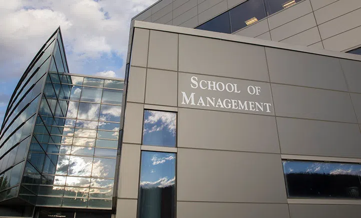 The academic a building with the "school of management" name on the front. 