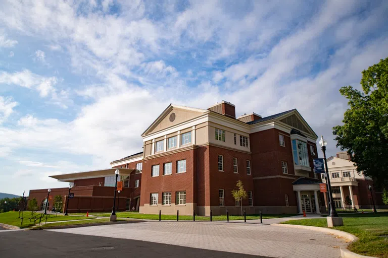 ground-level view of the side exterior of Academic East