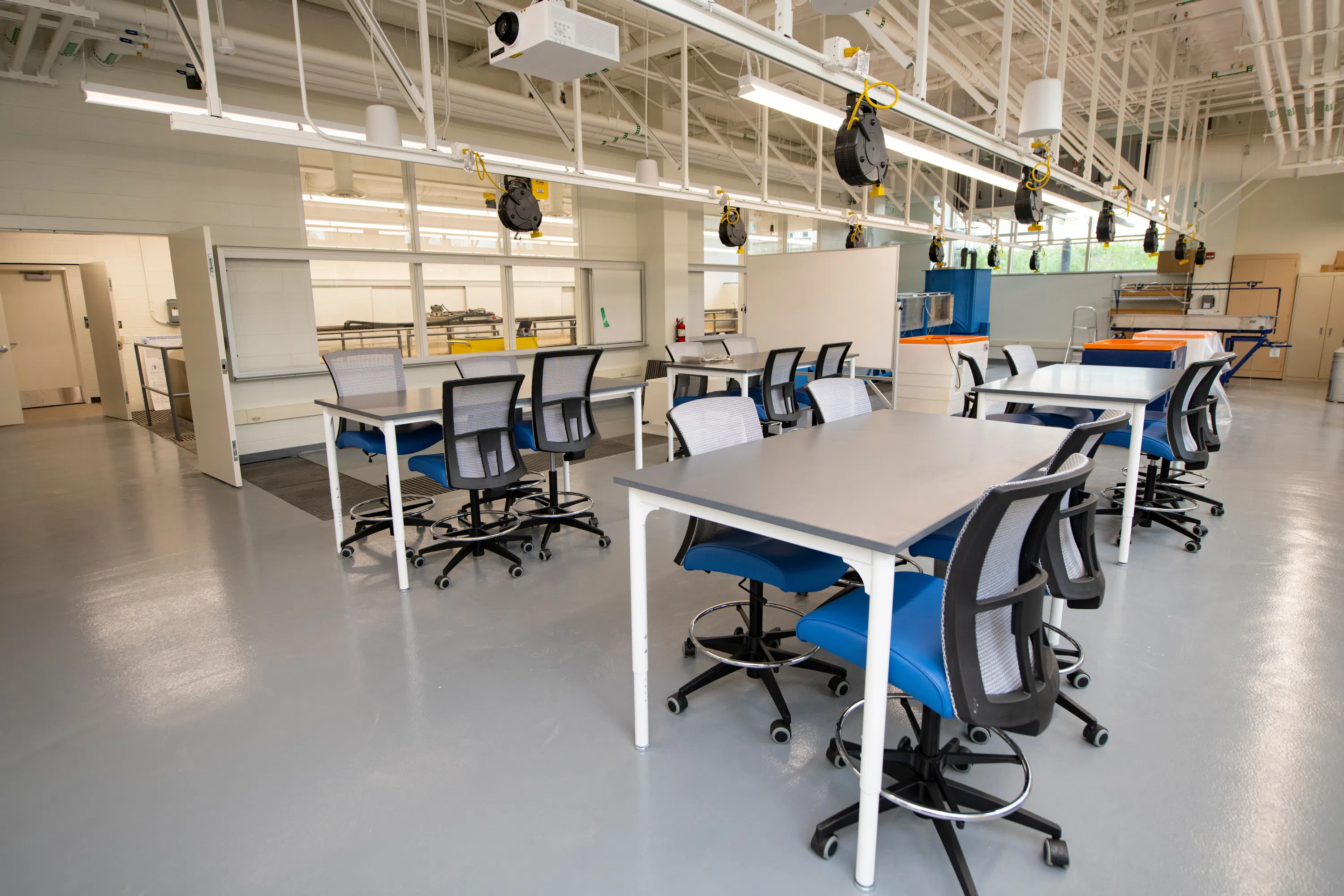 Several tables in a large classroom lab