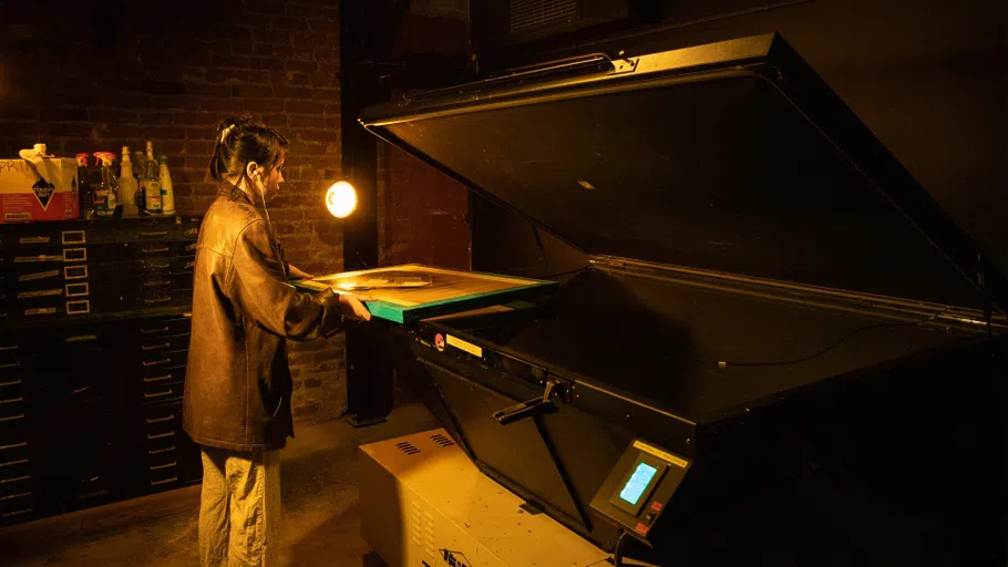  A student using a large scanner 