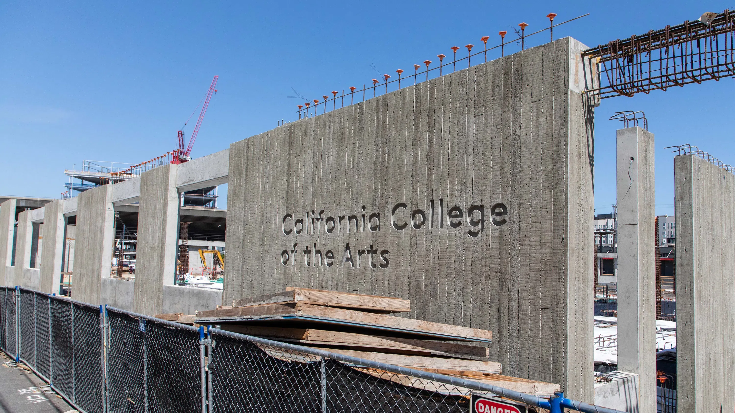 The words “California College of the Arts” engraved on a large slab.