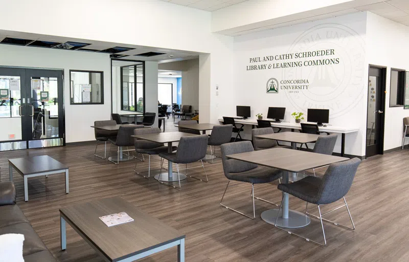 The entrance to the Schroeder Library and Learning Commons is used by students as a space to study or relax between classes. 