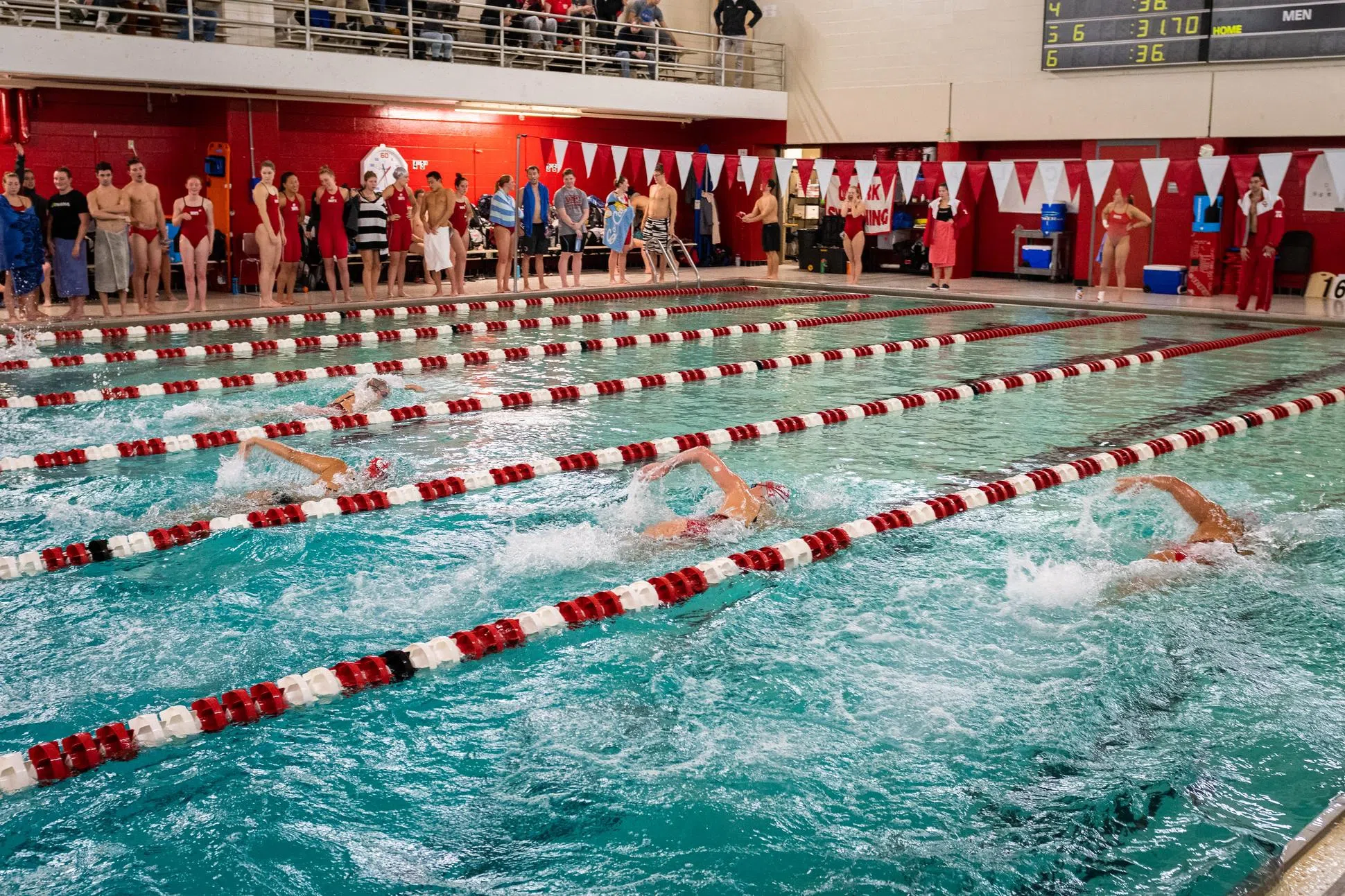 students competing in swim meet