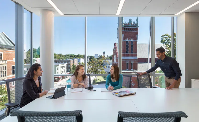 students gathering in conference room