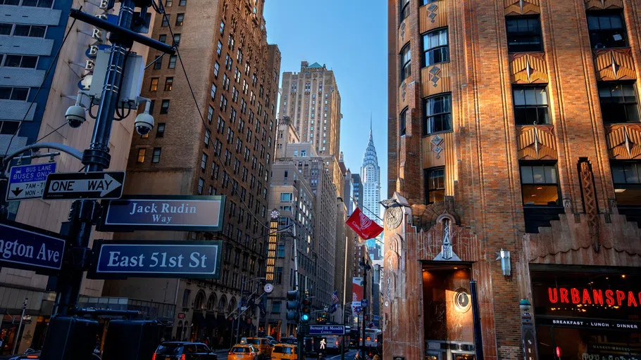 A shot of the exterior of Cornell’s midtown Manhattan hub, located in the old General Electric building. Its Art Deco-styled architecture is in the foreground, with other city buildings lining the street behind it.