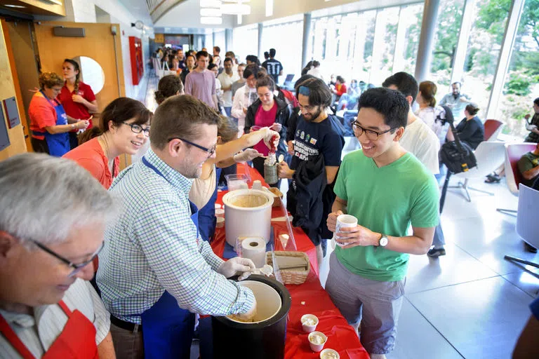 Cornell students, staff and faculty line up to try new Cornell Dairy ice cream flavors.