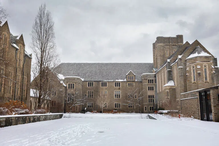 Anabel Taylor Hall courtyard is covered in snow.