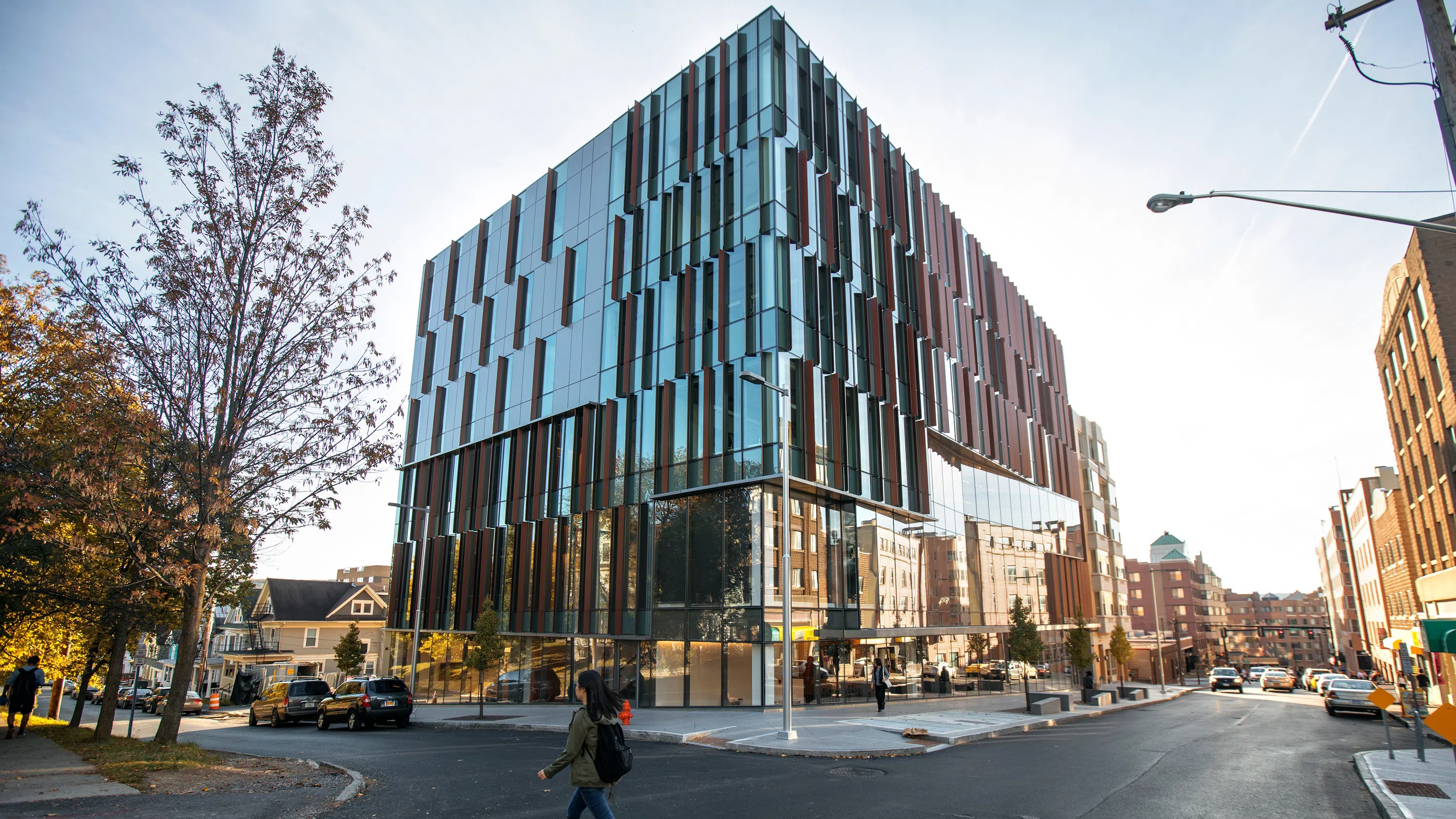 A wide-angle shot of the glass-and-steel exterior of the Breazzano Family Center for Business Education. 