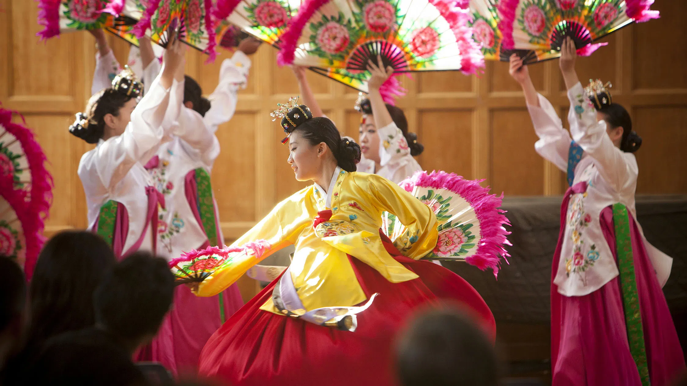 Dancers wearing traditional Hanboks perform in the Willard Straight Hall Memorial Room.