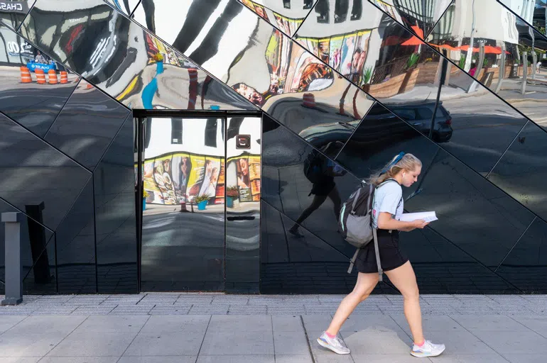 Student walking in front of Cleveland MOCA