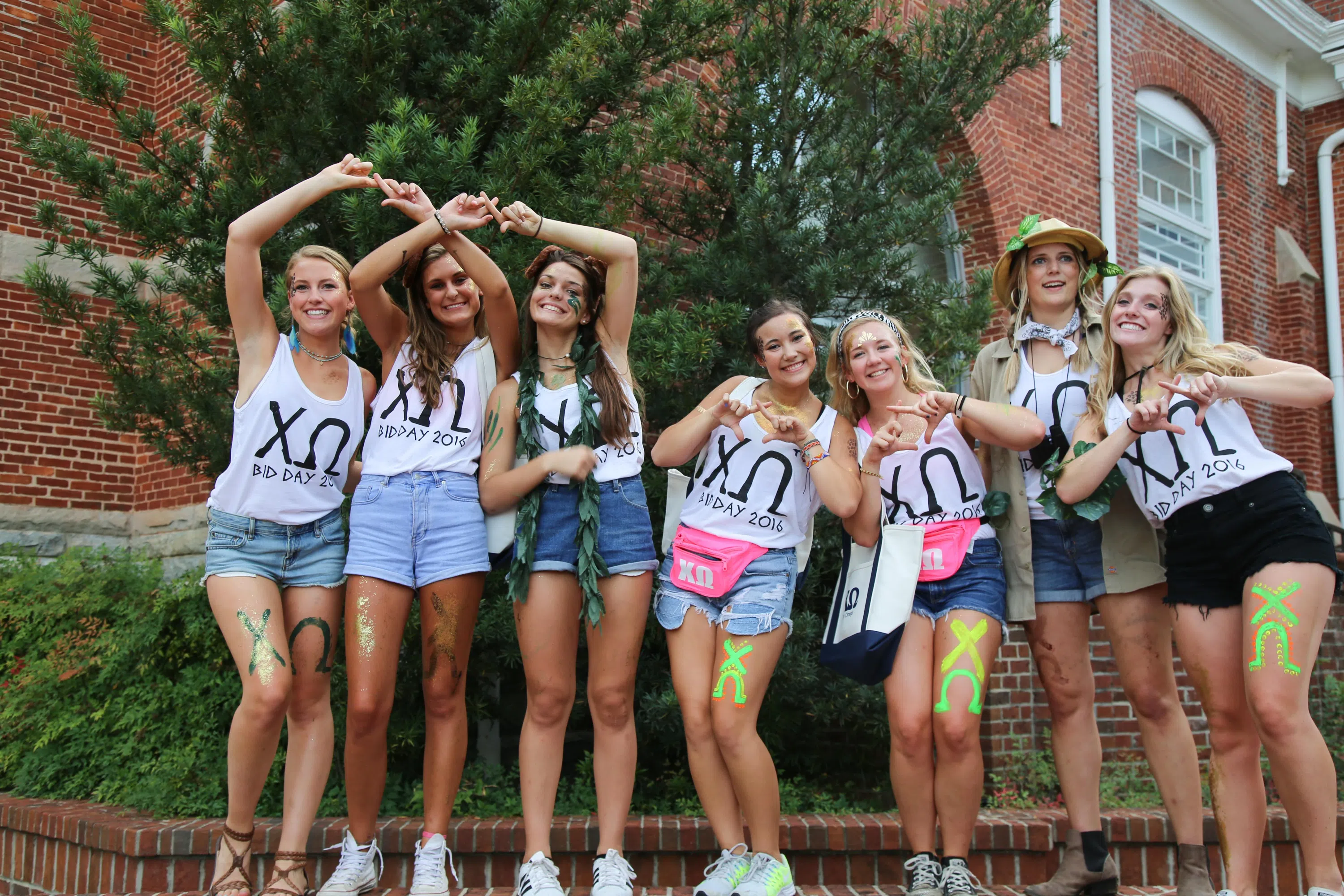 Students from the Chi Omega sorority pose for a photo on Bid Day.