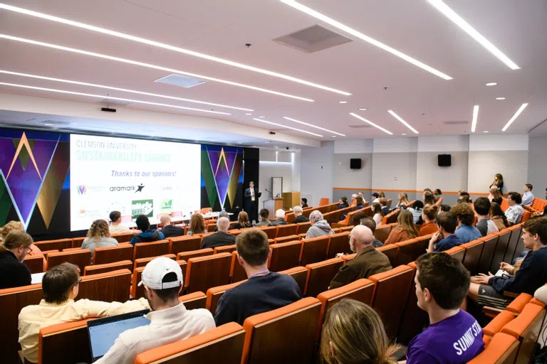 Clemson student Caleb Todd gives a presentation in the auditorium of the Watt Family Innovation Center.