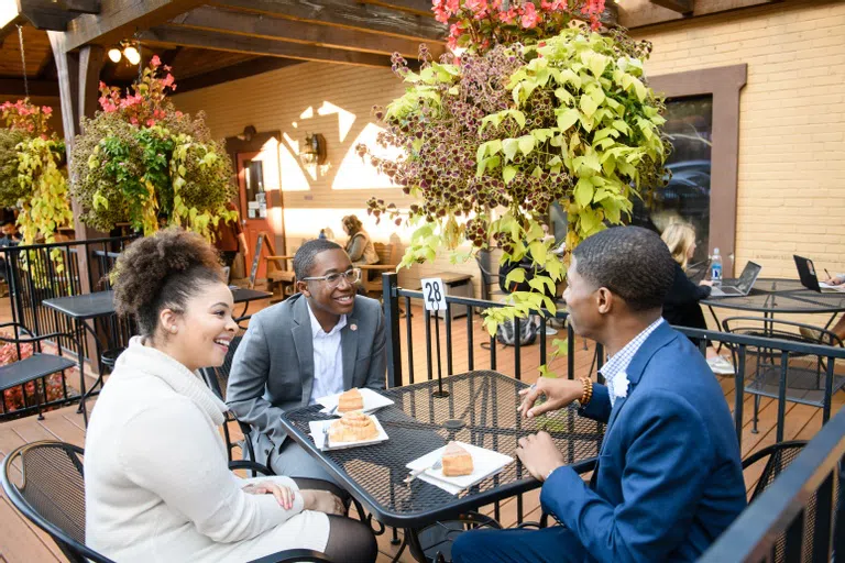 Clemson students spend time a local restaurant in downtown Clemson.