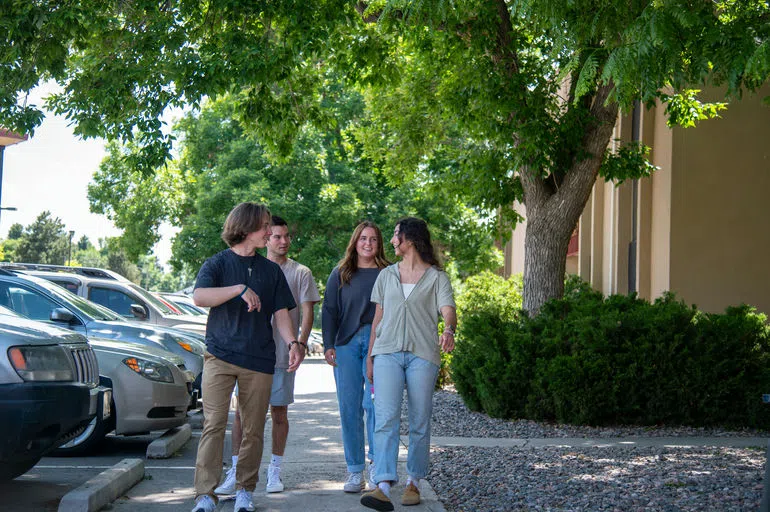 Friends heading to a meal from their Harwood and Waite apartments.