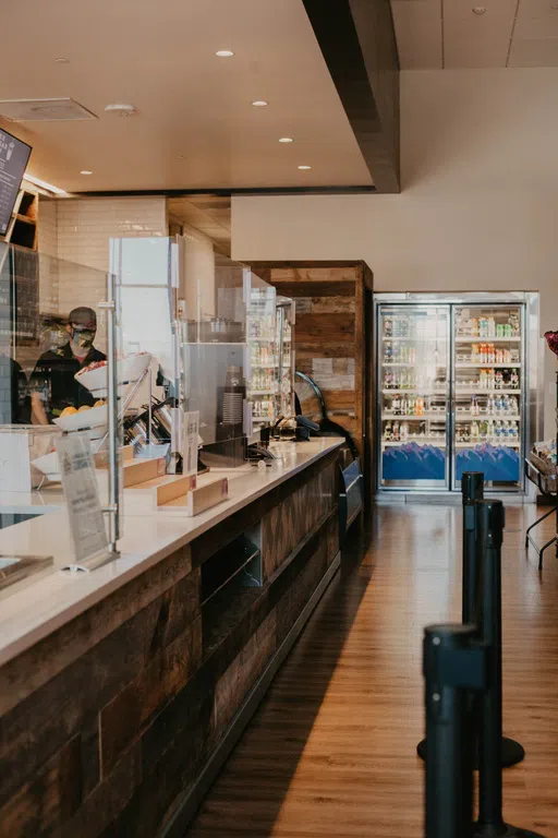 Coffee Shop with beverages on the far wall