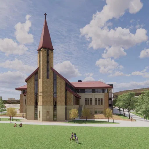 A large steeple connected to the Armstrong Center