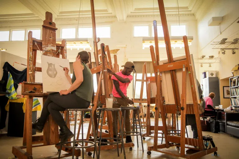 multiple easels in a classroom