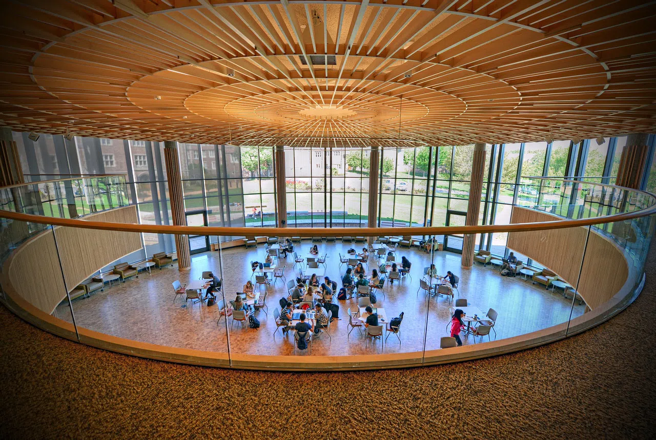 An interior view from the balcony overlooks the Clark-Fox forum, a rounded gathering space.