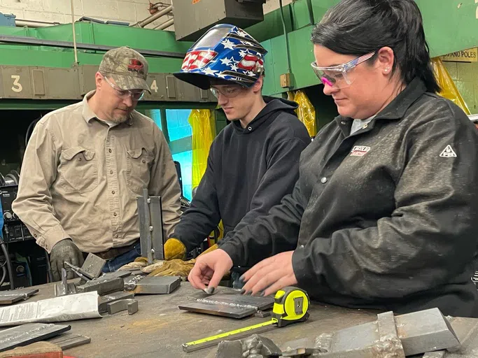 Students preparing to weld