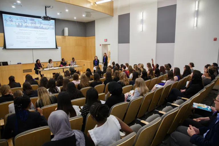 Students attending a Women's Leadership Program event in Ames Hall