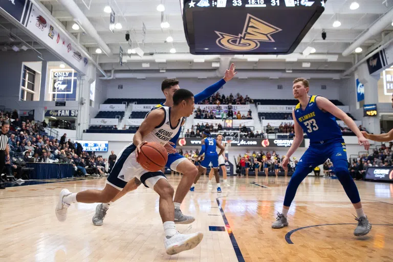 Basketball player dribbling in a game