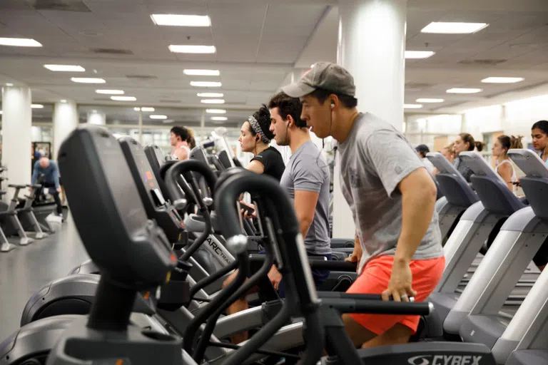 Students running on treadmills