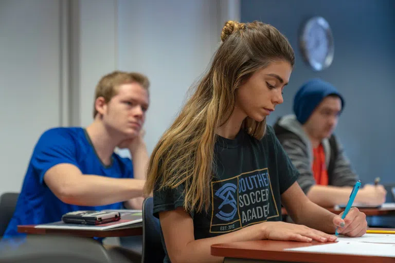 Students attending a class in the Bagby building