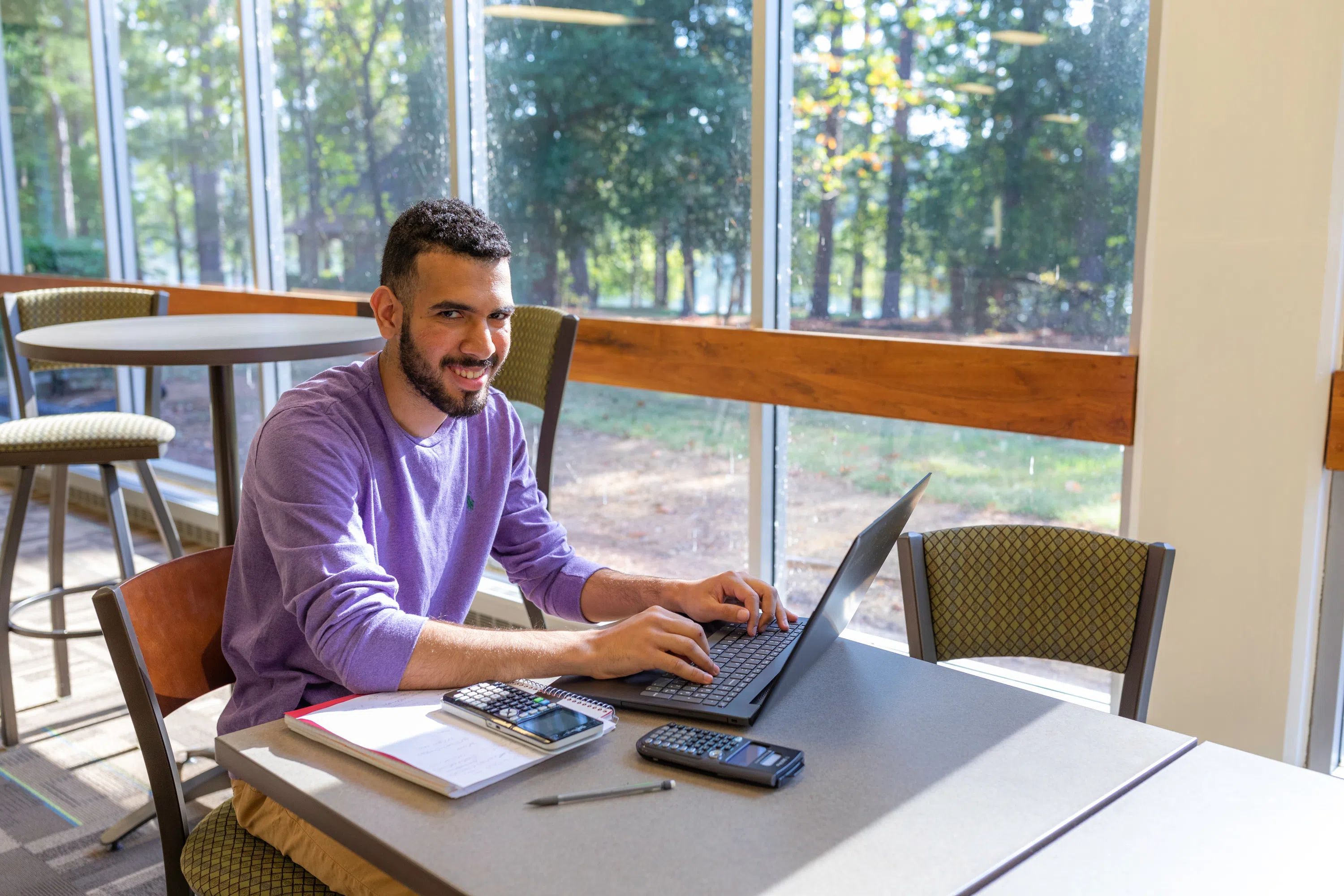 Student studies on a laptop